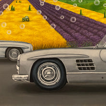 Load image into Gallery viewer,  Mercedes SL300 meets mountains at sunrise. Symbolic soap bubbles dance amid colourful fields, embodying luck and abundance. Realism and symbolism unite in this oil painting, a daily reminder of nature&#39;s harmony and the journey toward prosperity. 
